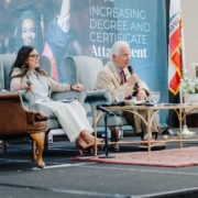 CVHEC Staff members At news conference giving crowd responses to informative questions.