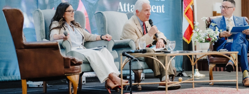 CVHEC Staff members At news conference giving crowd responses to informative questions.